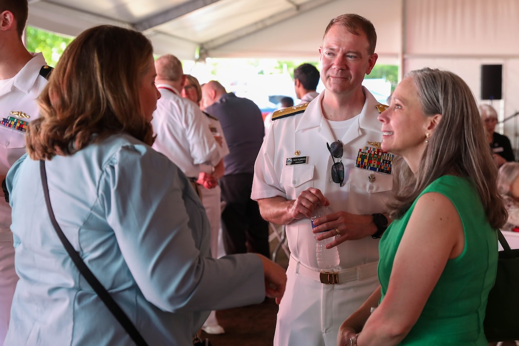 U.S. Navy Rear Adm. Nicholas Tilbrook, Commander of Submarine Group Nine, speaks with civillians during a Sip to Shore Reception for Portland Fleet Week June 6, 2024. Portland Fleet Week is a time-honored celebration of the sea services and provides an opportunity for the citizens of Oregon to meet Sailors, Marines and Coast Guardsmen, as well as witness firsthand the latest capabilities of today’s maritime services. (U.S. Navy photo by Mass Communication Specialist 3rd Class Justin Ontiveros)