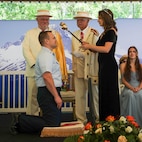 U.S. Coast Guard Command Master Chief Shane Carrol is knighted by Rose Festival Queen Deja Fitzwater during the Royal Rosarians Honorary Knighting Ceremony as part of Portland Fleet Week June 7, 2024. Portland Fleet Week is a time-honored celebration of the sea services and provides an opportunity for the citizens of Oregon to meet Sailors, Marines and Coast Guardsmen, as well as witness firsthand the latest capabilities of today’s maritime services. (U.S. Navy photo by Mass Communication Specialist 3rd Class Justin Ontiveros)