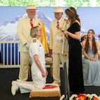 U.S. Navy Capt. Emily Alexandra Cathey, Commodore of Destroyer Squadron Nine, is knighted by Rose Festival Queen Deja Fitzwater during the Royal Rosarians Honorary Knighting Ceremony as part of Portland Fleet Week June 7, 2024. Portland Fleet Week is a time-honored celebration of the sea services and provides an opportunity for the citizens of Oregon to meet Sailors, Marines and Coast Guardsmen, as well as witness firsthand the latest capabilities of today’s maritime services. (U.S. Navy photo by Mass Communication Specialist 3rd Class Justin Ontiveros)