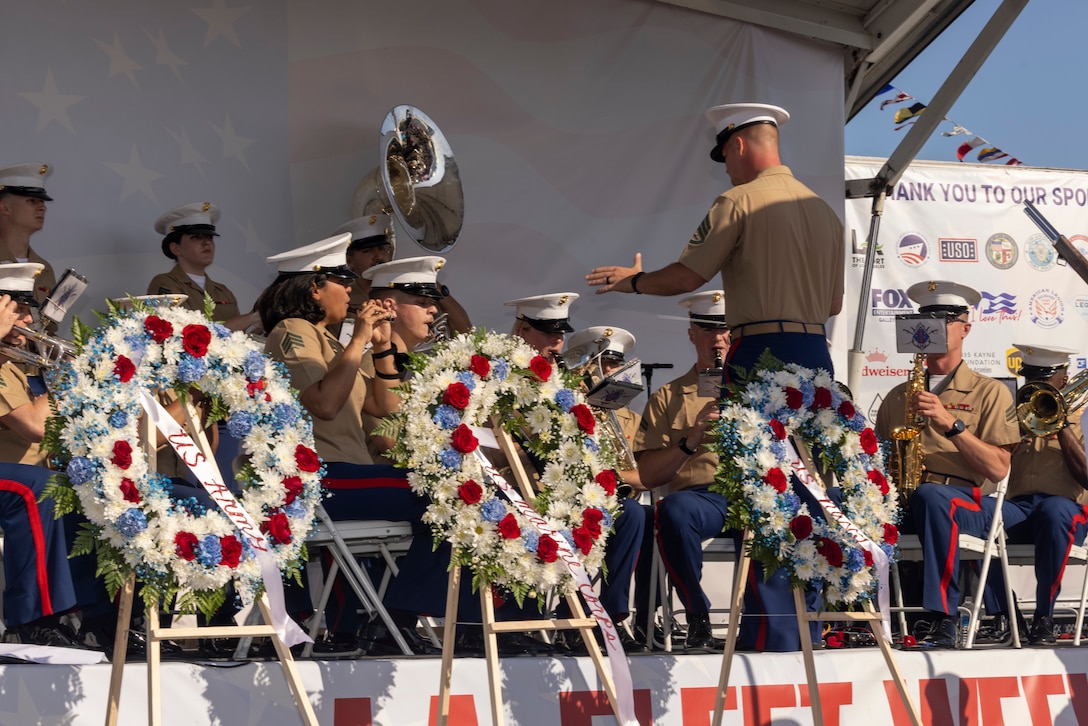 U.S. Marines with 1st Marine Division Band perform at a Memorial Day ceremony during Fleet Week 2024 in Los Angeles, May 27, 2024. Fleet Week is an annual, multi-day celebration of the nation's sea services held on the LA Waterfront at the Port of Los Angeles over the Memorial Day weekend. Free to the public, the event features public ship tours, military displays and equipment demonstrations, live entertainment, aircraft flyovers, and a Galley Wars culinary cook-off competition between Marine, Army, Navy and Coast Guard teams. (U.S. Marine Corps photo by Cpl. Adeola Adetimehin)