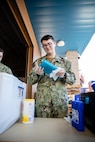 Gunner's Mate 3rd Class Smithfield Latkanich assigned to the Independence-variant littoral combat ship USS Gabrielle Giffords (LCS 10) assists in organizing food and supplies to be distributed to the community as a part of the annual Rose Festival during Portland Fleet Week in Portland, Oregon, June 7, 2024. Portland Fleet Week is a time-honored celebration of the sea services and provides an opportunity for the citizens of Oregon to meet Sailors, Marines and Coast Guardsmen, as well as witness firsthand the latest capabilities of today’s maritime services. (U.S. Navy photo by Mass Communication Specialist 2nd Class Jordan Jennings)