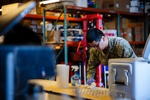 Electronics Technician 2nd Class Justin Yang assigned to the Independence-variant littoral combat ship USS Montgomery (LCS 8) assists in organizing food and supplies to be distributed to the community as a part of the annual Rose Festival during Portland Fleet Week in Portland, Oregon, June 7, 2024. Portland Fleet Week is a time-honored celebration of the sea services and provides an opportunity for the citizens of Oregon to meet Sailors, Marines and Coast Guardsmen, as well as witness firsthand the latest capabilities of today’s maritime services. (U.S. Navy photo by Mass Communication Specialist 2nd Class Jordan Jennings)