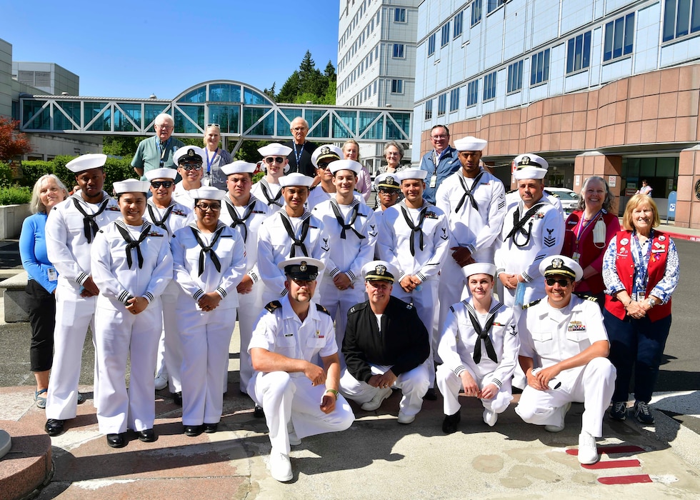 U.S. Navy Sailors pose for a photo during a visit to Portland VA Medical Center as part of the annual Portland Fleet Week and Rose Festival in Portland, Oregon June 7, 2024. Portland Fleet Week is a time-honored celebration of the sea services and provides an opportunity for the citizens of Oregon to meet Sailors, Marines and Coast Guardsmen, as well as witness firsthand the latest capabilities of today’s maritime services. (U.S. Navy photo by Mass Communication Specialist 1st Class Heather C. Wamsley)