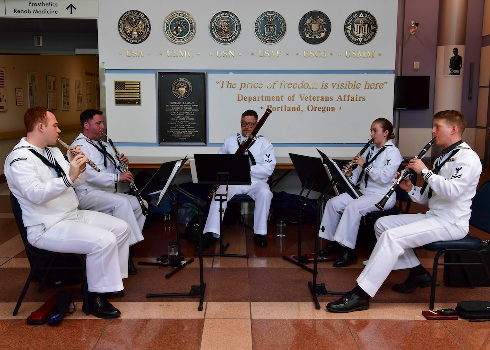 Sailors assigned to Navy Band Northwest perform at the Portland VA Medical Center during the annual Portland Fleet Week and Rose Festival in Portland, Oregon on June 7, 2024. Portland Fleet Week is a time-honored celebration of the sea services and provides an opportunity for the citizens of Oregon to meet Sailors, Marines and Coast Guardsmen, as well as witness firsthand the latest capabilities of today’s maritime services. (U.S. Navy photo by Mass Communication Specialist 1st Class Heather C. Wamsley)