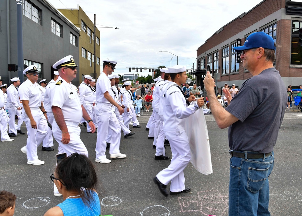 Sailors assigned to the Independence-variant littoral combat ship USS Montgomery (LCS 8) march in the Grand Floral Parade during the annual Portland Fleet Week and Rose Festival in Portland, Oregon June 8, 2024. Portland Fleet Week is a time-honored celebration of the sea services and provides an opportunity for the citizens of Oregon to meet Sailors, Marines and Coast Guardsmen, as well as witness firsthand the latest capabilities of today’s maritime services. (U.S. Navy photo by Mass Communication Specialist 1st Class Heather C. Wamsley)