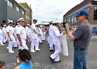 Sailors assigned to the Independence-variant littoral combat ship USS Montgomery (LCS 8) march in the Grand Floral Parade during the annual Portland Fleet Week and Rose Festival in Portland, Oregon June 8, 2024. Portland Fleet Week is a time-honored celebration of the sea services and provides an opportunity for the citizens of Oregon to meet Sailors, Marines and Coast Guardsmen, as well as witness firsthand the latest capabilities of today’s maritime services. (U.S. Navy photo by Mass Communication Specialist 1st Class Heather C. Wamsley)