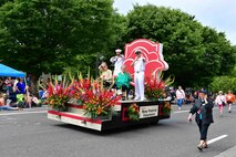 U.S. Navy Sailors ride on a float in the Grand Floral Parade during the annual Portland Fleet Week and Rose Festival in Portland, Oregon June 8, 2024. Portland Fleet Week is a time-honored celebration of the sea services and provides an opportunity for the citizens of Oregon to meet Sailors, Marines and Coast Guardsmen, as well as witness firsthand the latest capabilities of today’s maritime services. (U.S. Navy photo by Mass Communication Specialist 1st Class Heather C. Wamsley)