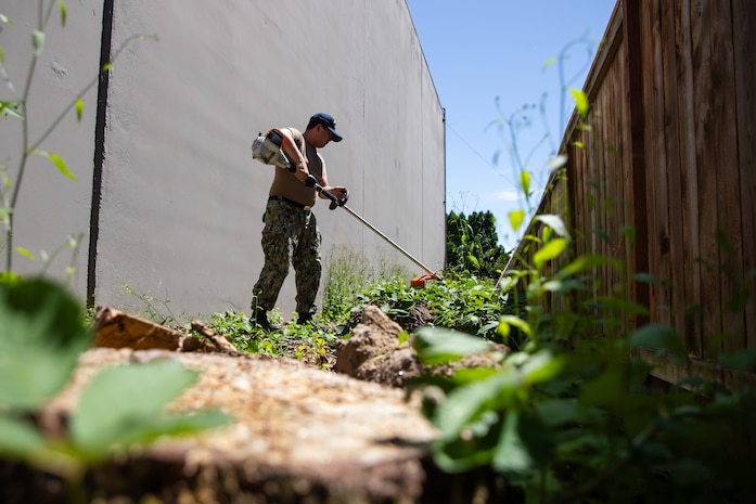 Culinary Specialist 3rd Class John Garcia assigned to the Independence-variant littoral combat ship USS Montgomery (LCS 8) assists in beautifying the exterior of a thrift store organized by Union Gospel Mission as a part of the annual Rose Festival during Portland Fleet Week in Portland, Oregon, June 8, 2024. Portland Fleet Week is a time-honored celebration of the sea services and provides an opportunity for the citizens of Oregon to meet Sailors, Marines and Coast Guardsmen, as well as witness firsthand the latest capabilities of today’s maritime services. (U.S. Navy photo by Mass Communication Specialist 2nd Class Jordan Jennings)