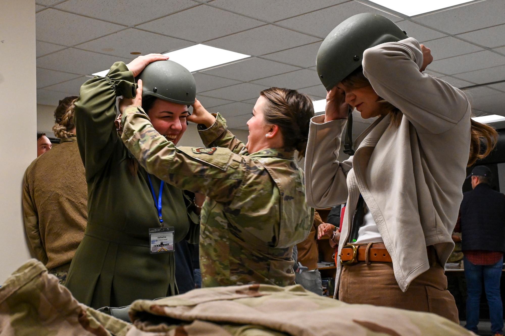 Honorary commanders try on helmets