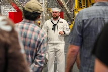 U.S. Navy Electronics Technician First Class Jason Rhoads conducts a tour of the USS Montgomery (LSC-8) during Portland Fleet Week June 9, 2024. Portland Fleet Week is a time-honored celebration of the sea services and provides an opportunity for the citizens of Oregon to meet Sailors, Marines and Coast Guardsmen, as well as witness firsthand the latest capabilities of today’s maritime services. (U.S. Navy photo by Mass Communication Specialist 3rd Class Justin Ontiveros)