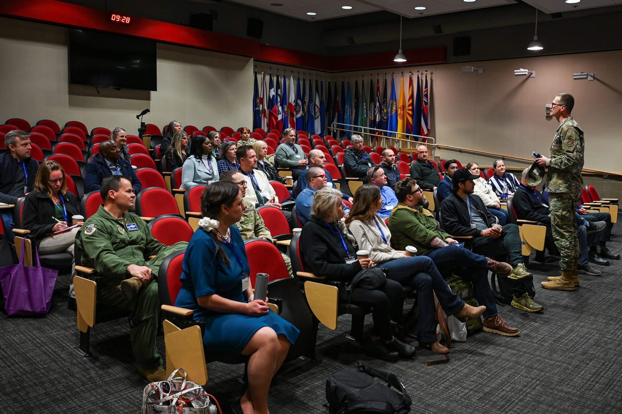 An Airman briefs honorary commanders about JBER missions