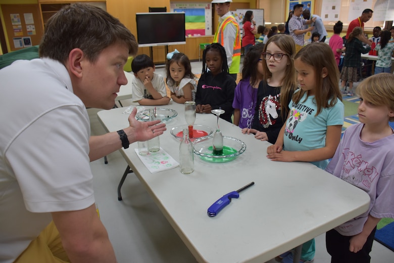 Mr. Daniel Carlson, Fire Protection Engineer, U.S. Army Corps of Engineers – Far East District, captivates students at a STEAM event hosted by USACE at West Elementary School on Camp Humphreys, South Korea, on May 24. Demonstrating the importance of engineering, Mr. Carlson sparks interest and excitement in the field through engaging, hands-on activities and real-world applications. (U.S. Army photo by Rachel Napolitan)