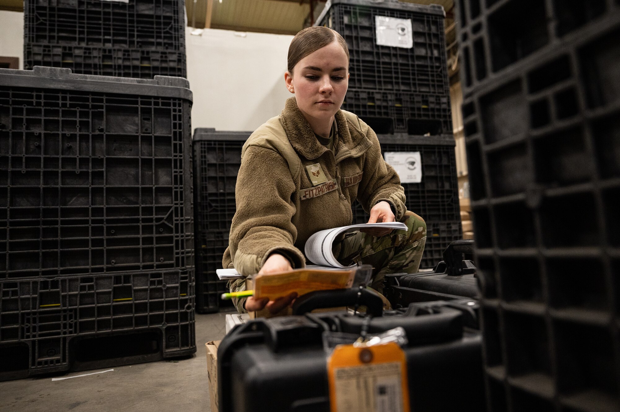 Senior Airman Laura Fitzpatrick, 8th Healthcare Operations Squadron medical material technician, checks equipment inventory.