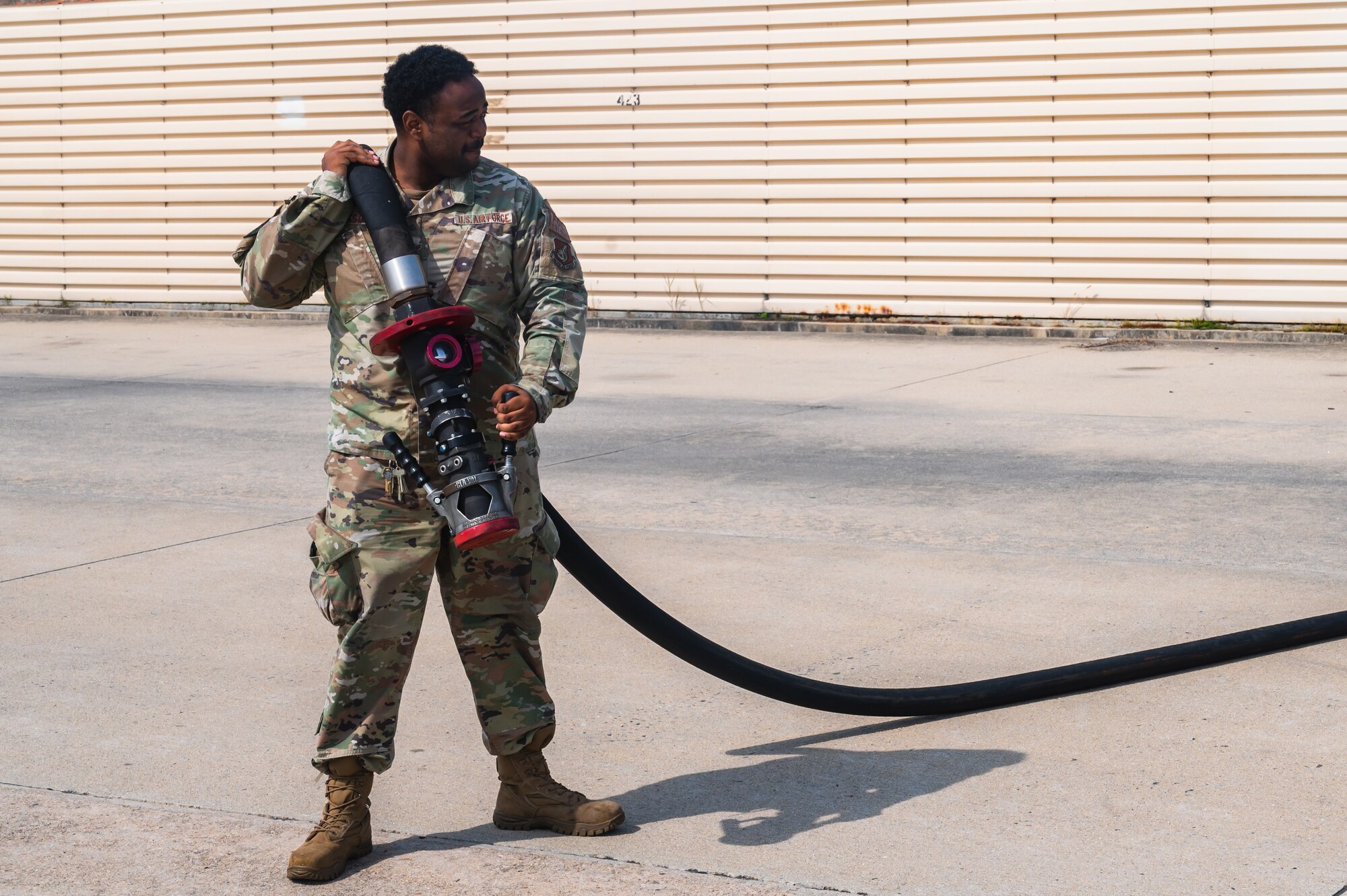 Senior Airman Darryus Jackson, 8th Logistics Readiness Squadron fuels facilities technician, removes a hose from an Oshkosh R-11 refueling unit
