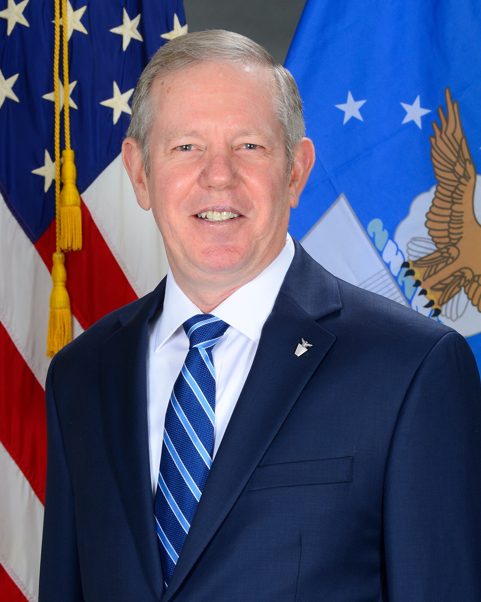 Man in suit, official photo