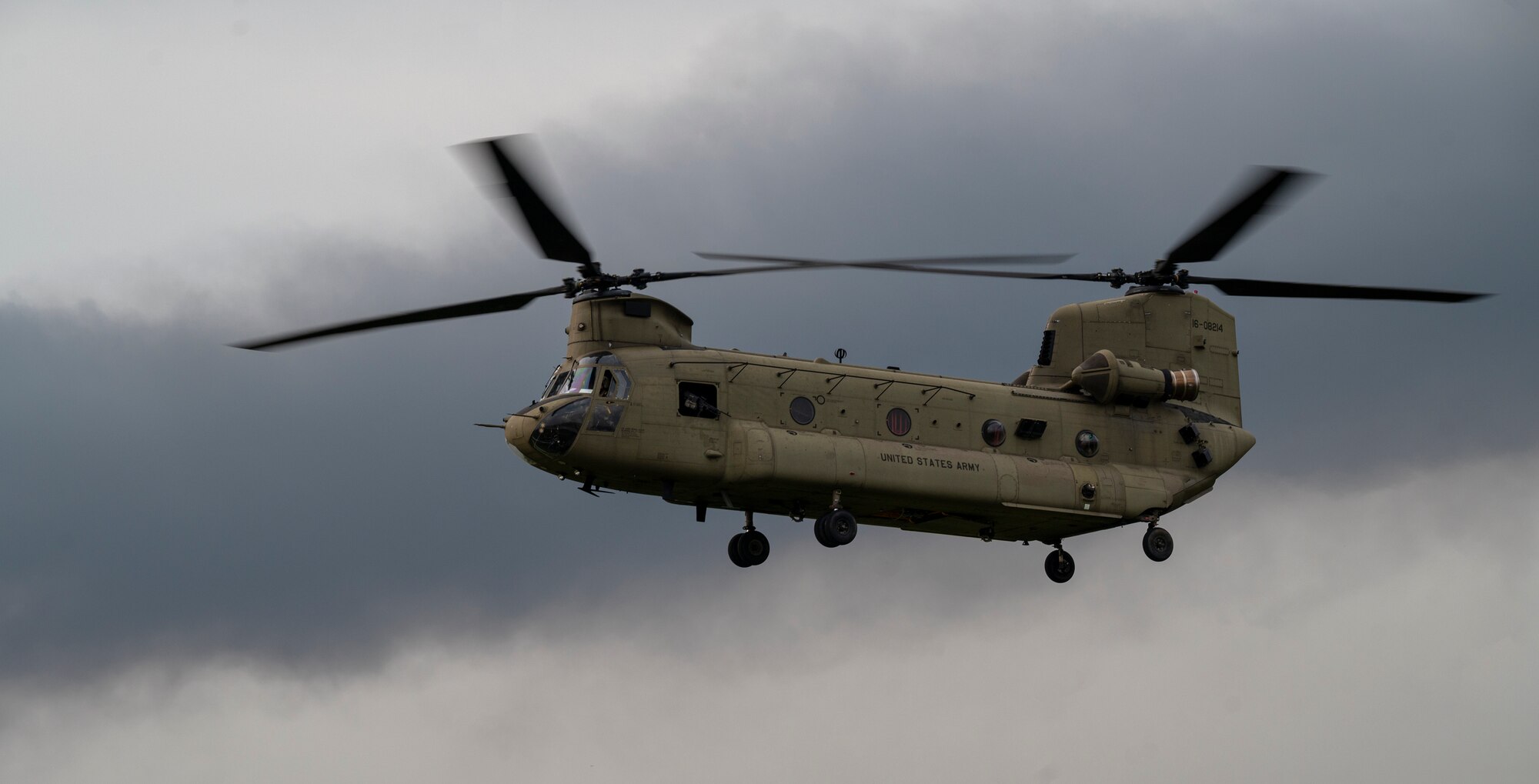 A U.S. Army CH-47 Chinook assigned to the 3rd General Support Aviation Battalion, 2nd Combat Aviation Brigade, 2nd Infantry ROK/U.S. Combined Division, flies through the sky during a joint training event at Osan Air Base, Republic of Korea, June 5, 2024. This integrated training demonstrates the 51st Fighter Wing's ability to combine interoperability and operate with other United States Forces Korea units in defense of the peninsula by aligning skill sets across the command. (U.S. Air Force photo by Senior Airman Sabrina Fuller-Judd)