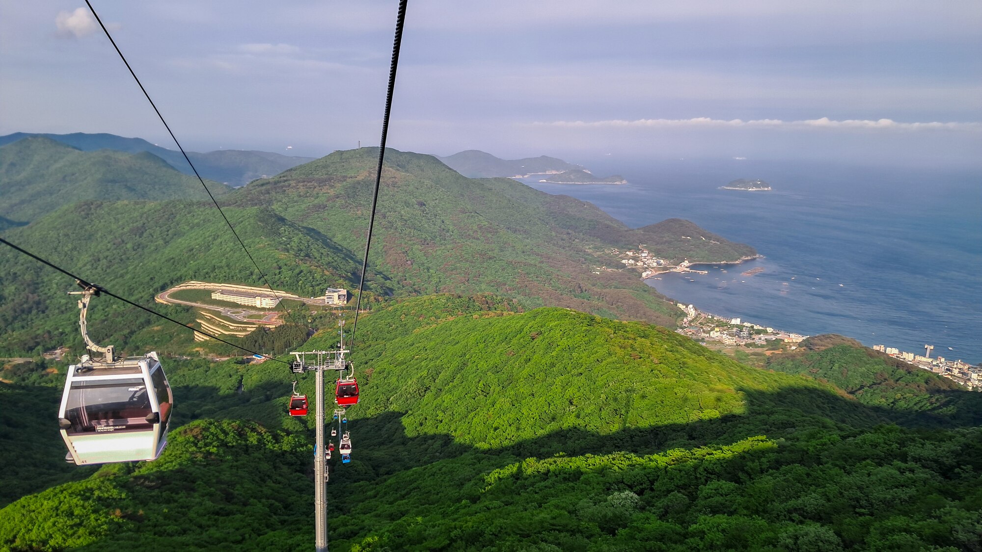 Visitors take the Geoje Panorama Cable Car from Hakdong Pass to the summit of Nojasan Mountain in Geoje, Republic of Korea, May 1, 2024.
