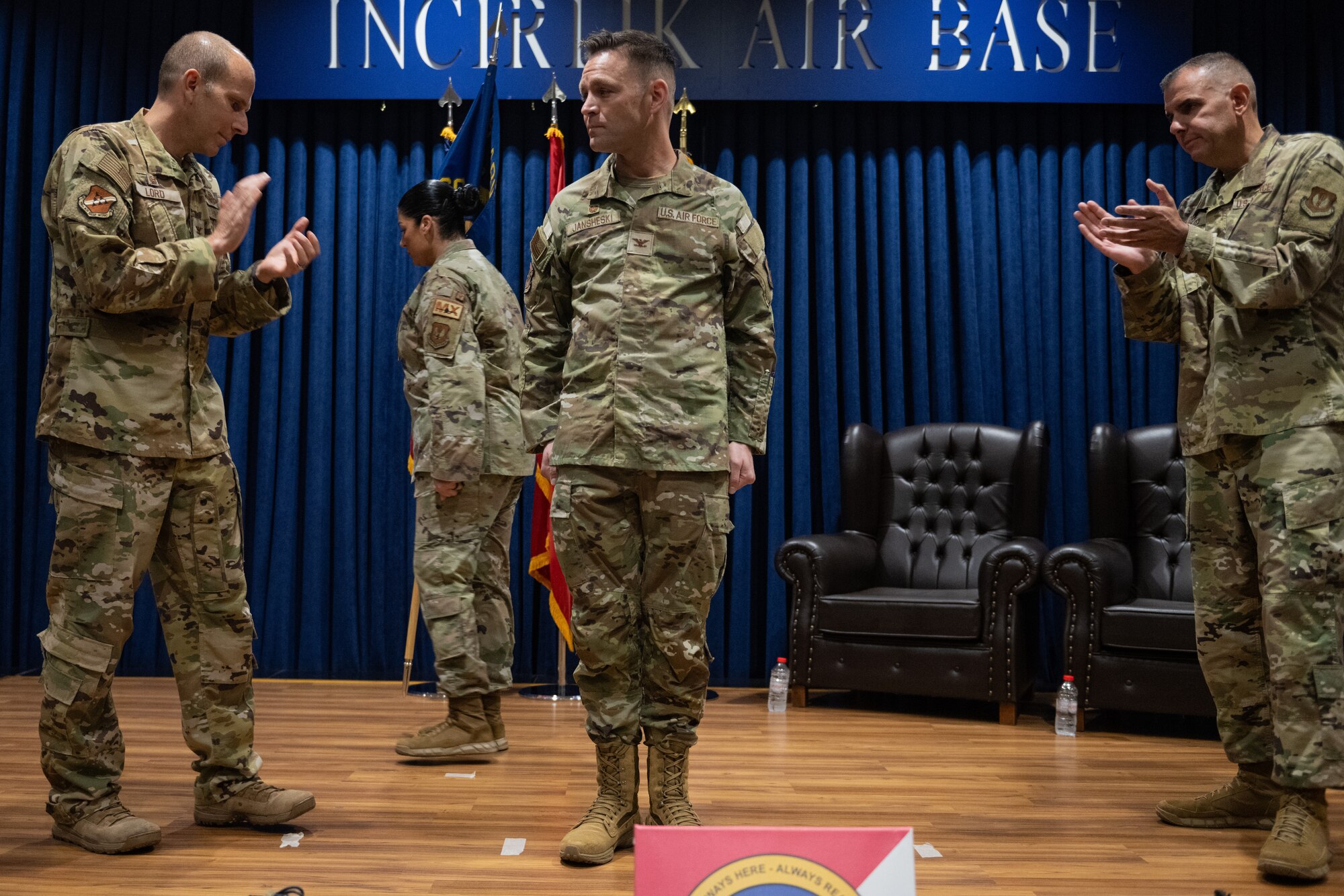 U.S. Air Force Col. Kevin Lord, 39th Air Base Wing commander, Col. John Jansheski, 39th Weapons System Security Group commander, Col. Michael Gallucci, 39th WSSG outgoing commander, celebrate after exchanging the guidon during a change of command ceremony.