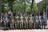 United States Navy and Royal Australian Navy Sailors enrolled in the U.S. Naval Submarine School’s Basic Enlisted Submarine School pose for a photo between training sessions aboard the Naval Submarine Base New London in Groton, Connecticut, Jun. 11, 2024.