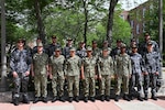 United States Navy and Royal Australian Navy Sailors enrolled in the U.S. Naval Submarine School’s Basic Enlisted Submarine School pose for a photo between training sessions aboard the Naval Submarine Base New London in Groton, Connecticut, Jun. 11, 2024.
