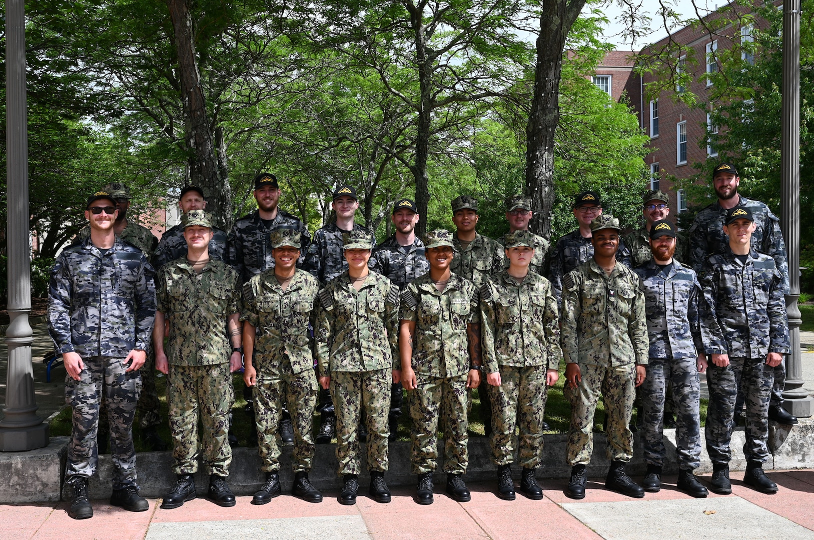 United States Navy and Royal Australian Navy Sailors enrolled in the U.S. Naval Submarine School’s Basic Enlisted Submarine School pose for a photo between training sessions aboard the Naval Submarine Base New London in Groton, Connecticut, Jun. 11, 2024.