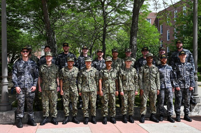 United States Navy and Royal Australian Navy Sailors enrolled in the U.S. Naval Submarine School’s Basic Enlisted Submarine School pose for a photo between training sessions aboard the Naval Submarine Base New London in Groton, Connecticut, Jun. 11, 2024.