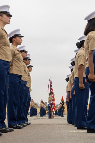 U.S. Marines with the Marine Corps Recruit Depot San Diego stand during the Fox Company graduation ceremony at MCRD San Diego, California, May 31, 2024. Graduation takes place at the end of the 13-week transformation process, which includes training for drill, marksmanship, basic combat skills, and Marine Corps customs and traditions. (U.S. Marine Corps photo by Lance Cpl. Janell B. Alvarez)