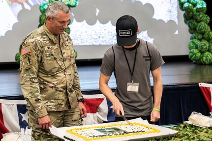 Person cuts cake