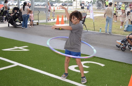Child with hoola hoop