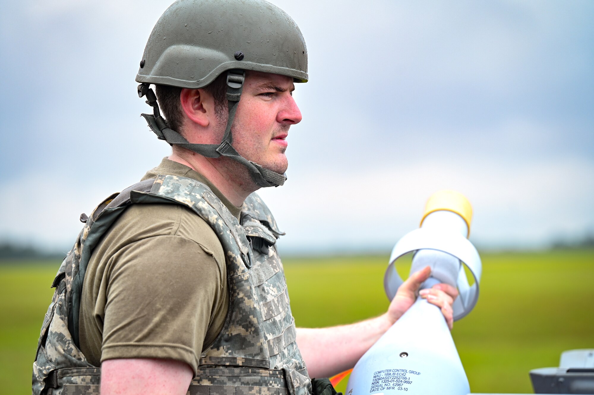Military member carries a bomb.