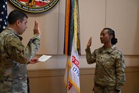 The D.C. National Guard's Maj. Gen. John C. Andonie, commanding general (interim), swears in Lt. Col. Nushat Thomas as the new deputy inspector general at the D.C. Armory on June 8, 2024. Thomas assumed the position following the retirement of Lt. Col. Tera Powell in early spring 2024 after 24 years of service.