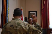 The D.C. National Guard's Maj. Gen. John C. Andonie, commanding general (interim), swears in Lt. Col. Nushat Thomas as the new deputy inspector general at the D.C. Armory on June 8, 2024. Thomas assumed the position following the retirement of Lt. Col. Tera Powell in early spring 2024 after 24 years of service.
