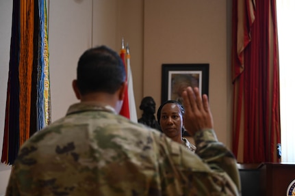 The D.C. National Guard's Maj. Gen. John C. Andonie, commanding general (interim), swears in Lt. Col. Nushat Thomas as the new deputy inspector general at the D.C. Armory on June 8, 2024. Thomas assumed the position following the retirement of Lt. Col. Tera Powell in early spring 2024 after 24 years of service.