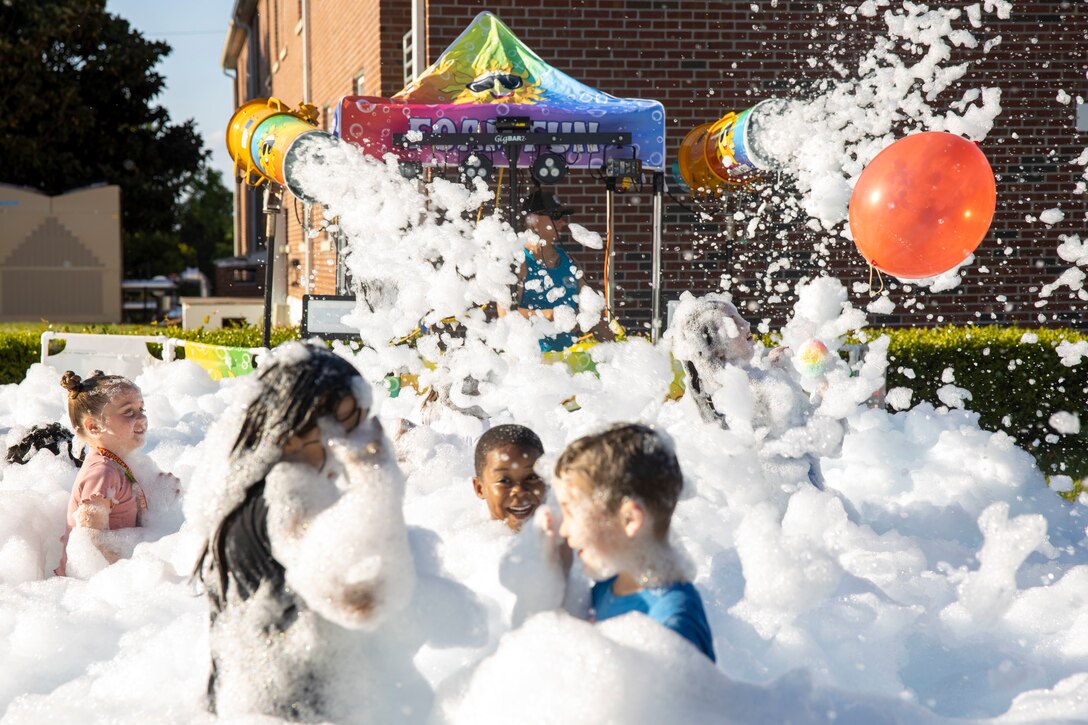 U.S Marines, Sailors and their families participate in the 2nd annual military kids celebration at Marine Corps Base Camp Lejeune, North Carolina, April 26, 2024. The event was hosted by II Marine Expeditionary Force Support Battalion and was held to educate service members and their families on available resources and to celebrate the month of the military child. (U.S. Marine Corps photo by Cpl. Jacquilyn Davis)