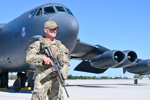 A U.S. Airman guards a B-52