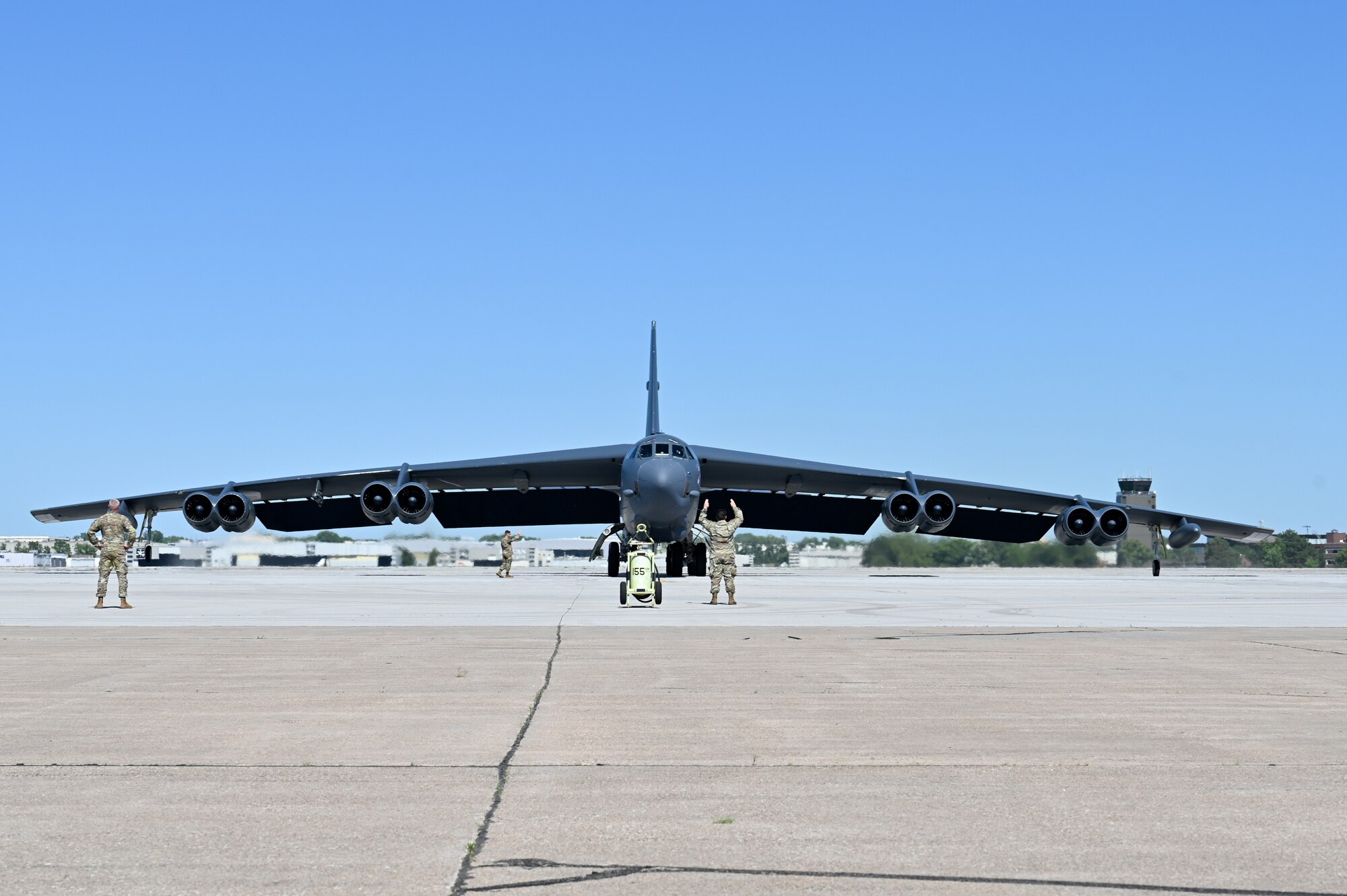 A B-52 Stratofortress stands on a flightline.