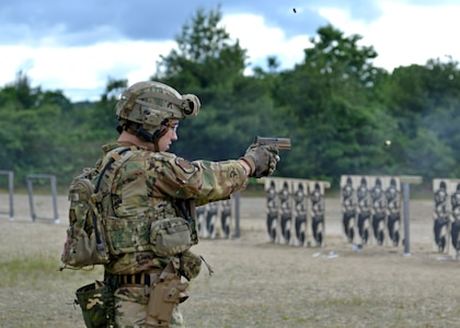 Airman 1st Class Nicholas Denton of 157th Civil Engineering Squadron, New Hampshire Air National Guard, shoots the “Anti-Body Armor” pistol course at the 2024 New Hampshire National Guard Combat Marksmanship Match on June 6 at Fort Devens, Mass. About 90 competitors, including shooters from El Salvador, Cabo Verde and Canada, competed in the three-day event. One of the six Airmen to compete at the predominantly Army match finished eighth out of 90 competitors. Photo by Master Sgt. Charles Johnston, NHNG Deputy State PAO.