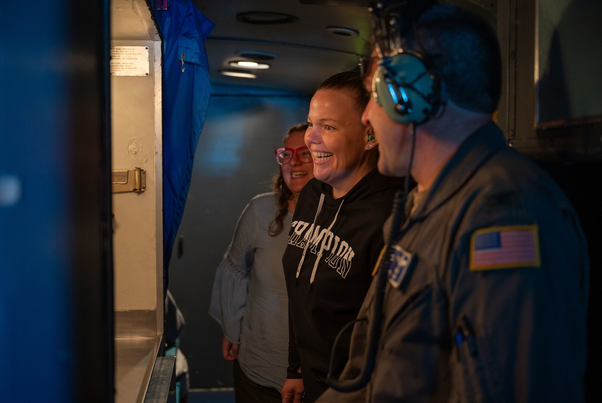 U.S. Air Force Col. Rusty Gohn, right, 436th Airlift Wing deputy commander, talks with Members of the Central Delaware Chamber of Commerce Leadership Central Delaware program during a public affairs flight at Dover Air Force Base, Delaware, June 12, 2024. The LCD members flew with the 9th Airlift Squadron as part of a community engagement opportunity to learn how Dover AFB stays prepared to deliver rapid global mobility. (U.S. Air Force photo by Senior Airman Amanda Jett)