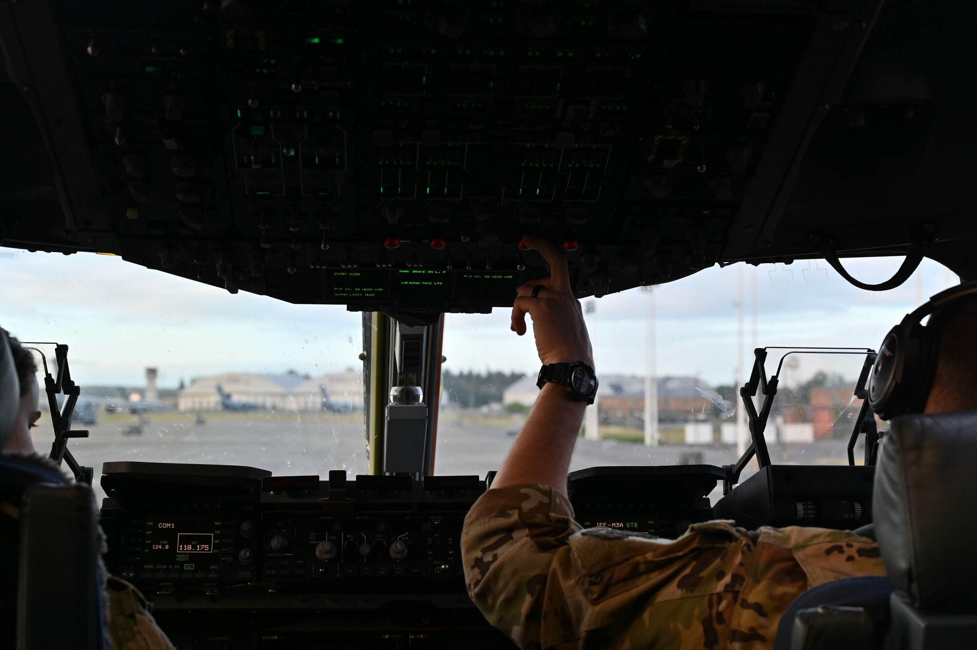 U.S. Air Force Capt. Ethan Hoder, a pilot with the 4th Airlift Squadron, prepares to take flight in a C-17 Globemaster III at Joint Base Lewis-McChord, Washington, June 12, 2024. Airmen with the 4th AS are completing a contingency mission to guarantee the execution of today’s global airlift mission. (U.S. Air Force photo by Airman 1st Class Kylee Tyus)