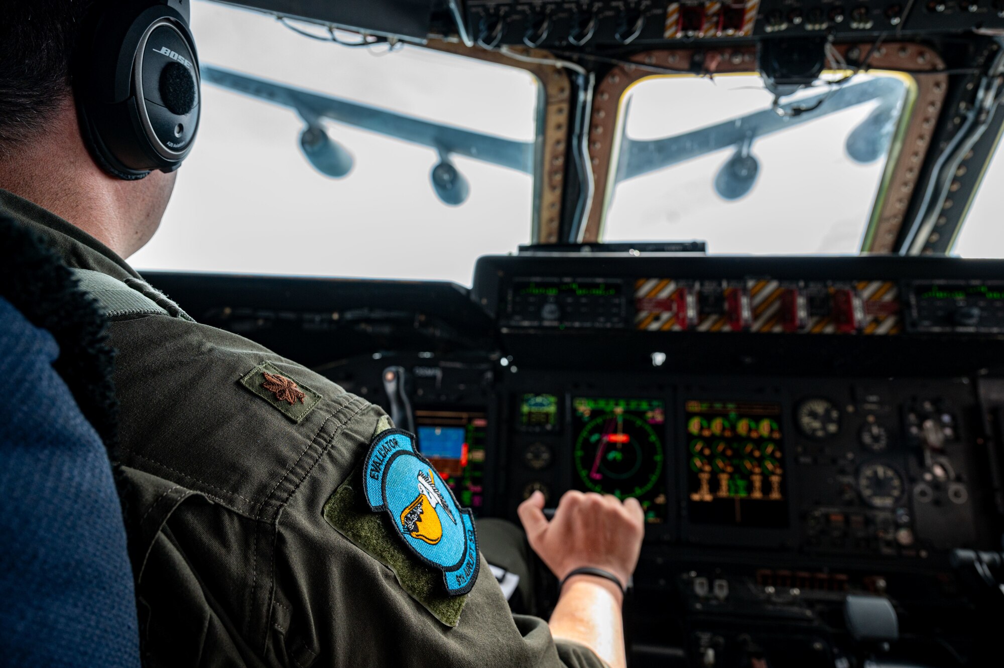 U.S. Air Force Maj. Jason Cryder, 9th Airlift Squadron pilot, prepares to attach a C-5M Super Galaxy to a KC-135 Stratotanker during an aerial refueling mission over Tennessee, June 13, 2024. Aerial refueling capability has enhanced the global reach of the United States Air Force. (U.S. Air Force photo by Senior Airman Amanda Jett)