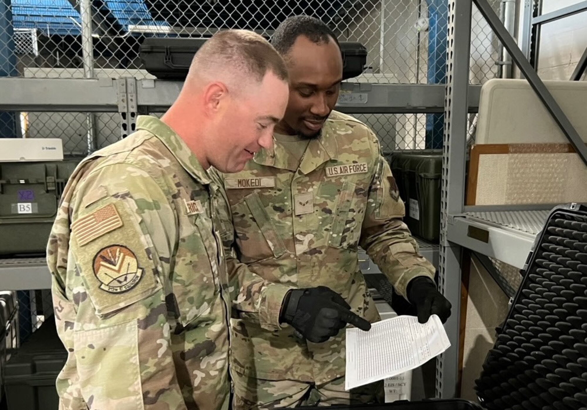 Members of the 102nd Logistics Readiness Squadron and the 212th Engineering Installation Squadron participate in pallet-building training on Otis Air National Guard Base, Massachusetts, June 4, 2024. The traffic management office (TMO) taught participants how to palletize equipment in preparation for the potential call to get materials and troops out the door in 72 hours for deployments or emergency responses.