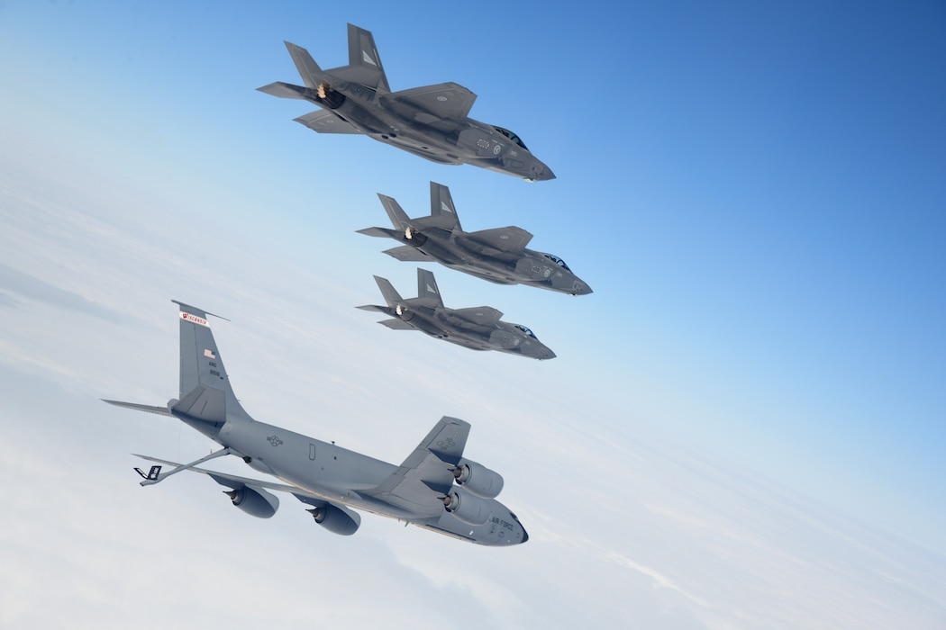 F-35 Lightning IIs flown by members of the Royal Norwegian air force conduct aerial refueling operations with a KC-135 Stratotanker