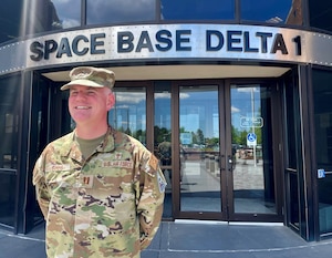 U.S. Air Force chaplain Conner Simms stands in front of the Space Base Delta 1 headquarters building on Peterson Space Force Base, Colorado, June 12, 2024. As a member of Space Base Delta 1's Guardian Resilience Team, Simms provides Guardians and Airmen around the world with support, confidential and privileged communication, spiritual counseling. (U.S. Space Force photo by Emily Peacock)