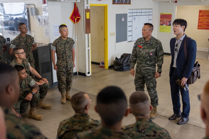 Sgt. Maj. Sang Gyun Yoon, the Republic of Korea Sergeant Major of the Marine Corps, engages with the new Marines with Fox Company, 2nd Recruit Training Battalion, at Marine Corps Recruit Depot San Diego, California, May 24, 2024. Sgt. Maj. Sang Gyun Yoon visited the recruit depot to gain a deeper understanding of U.S. Marine Corps training methods and to explore how these techniques could be integrated into their own Marine Corps training programs. (U.S. Marine Corps photo by Lance Cpl. Jacob B. Hutchinson)
