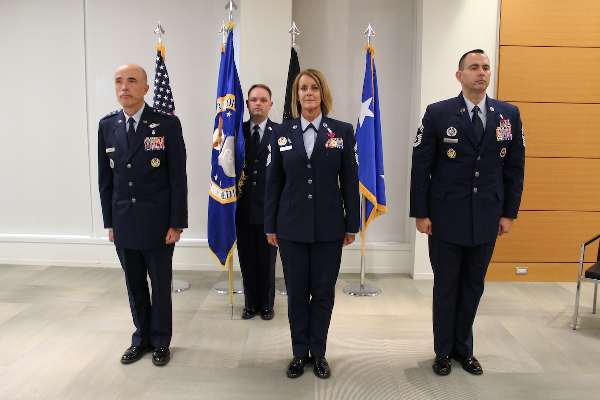 Image of Airmen posing for a photo.