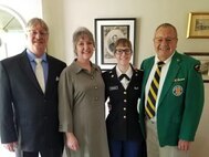 The Rollin Family after Victoria's commissioning ceremony. (Dad- Kevin Rollin, Mom-  Lisa Rollin, Victoria and her grandfather Roger Weinhold