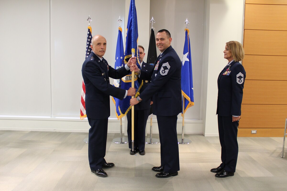 Image of Airmen posing for a photo.