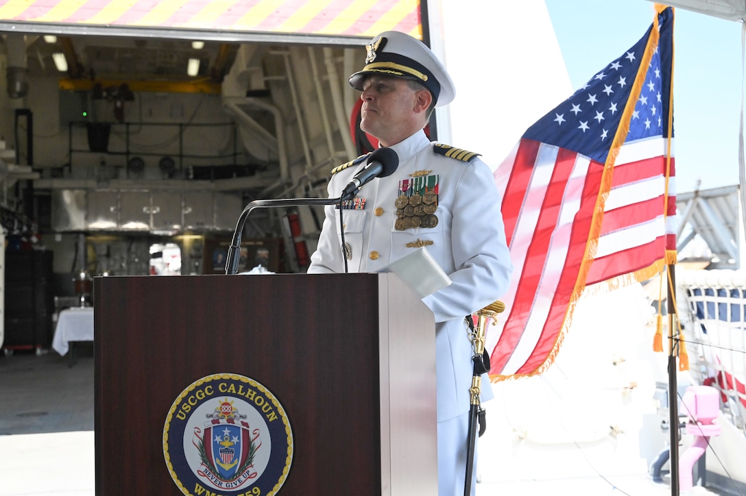 Capt. Timothy Sommella looks out upon the crowd while delivering remarks during U.S. Coast Guard Cutter Calhoun's (WMSL 758) change-of-command ceremony, June 11, 2024, in North Charleston, South Carolina. The change-of-command ceremony is a time-honored military tradition that marks a transfer of total authority and responsibility from one individual to another. (U.S. Coast Guard photo by Petty Officer 3rd Class Amber Mcgruder)