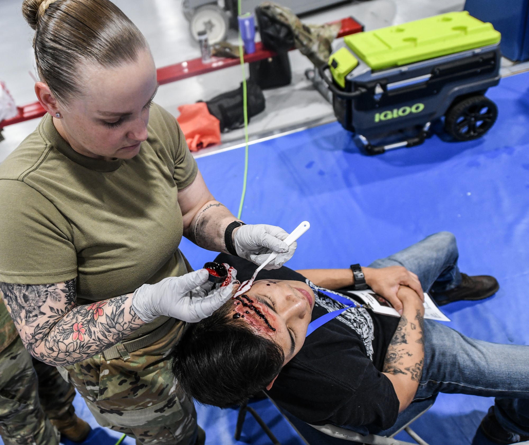 medic applies wound makeup