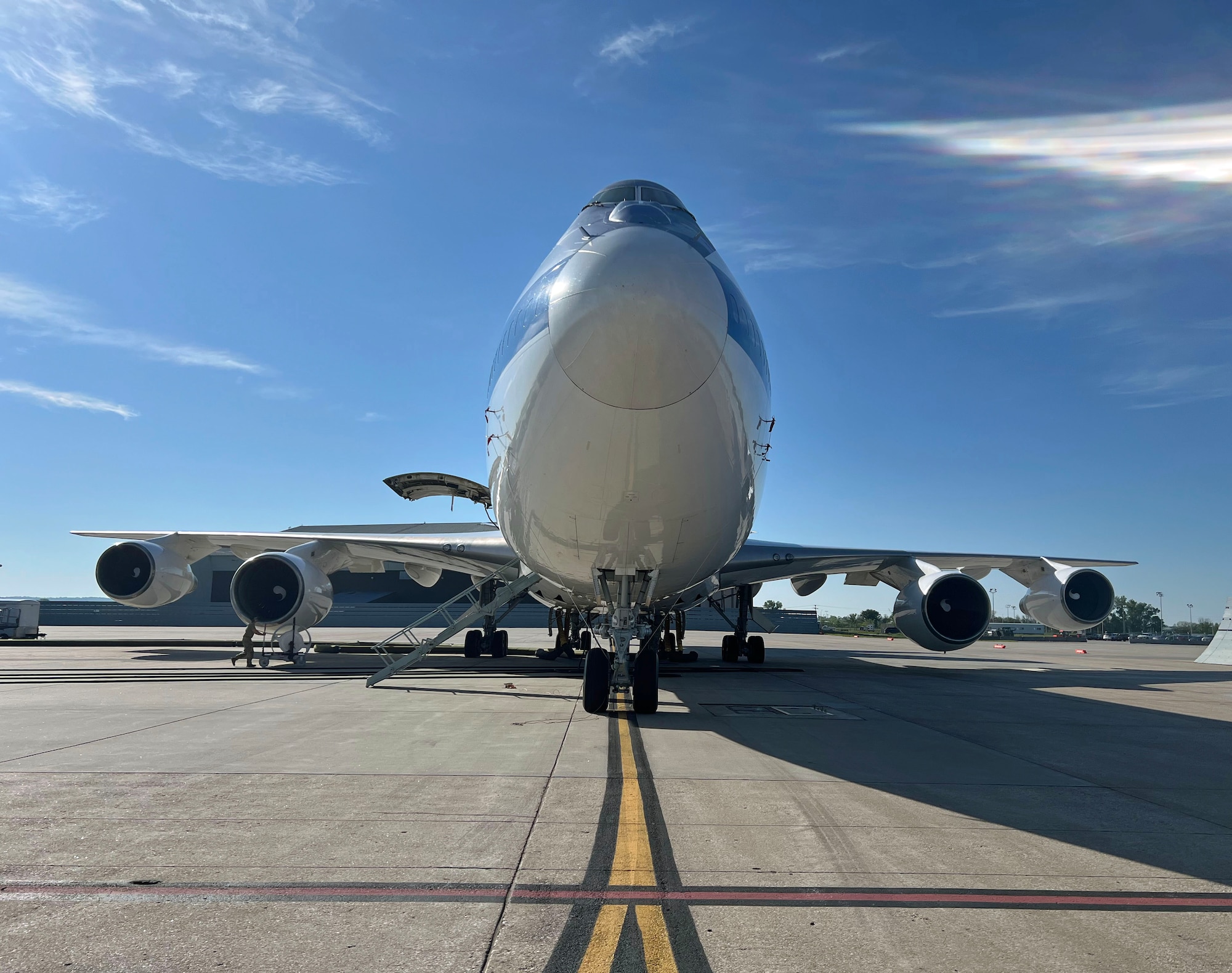 Airmen perform last-minute pre-checks on a U.S. Air Force E-4B before the crew departs on a Midwest training sortie from Offutt Air Force Base, Neb., May 15, 2024. The E-4B, also referred to as the National Airborne Operations Center (NAOC), routinely conducts global command and control missions for the Secretary of Defense when traveling overseas due to its robust communication capabilities. (U.S. Air Force photo)